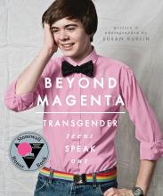 teen boy in pink shirt and rainbow belt and jeans with a black bow tie smiles and runs hand through his hair